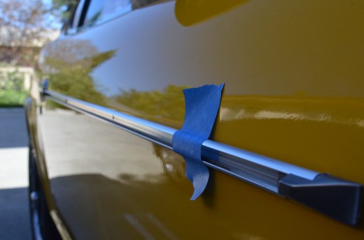 Holding the side moulding with tape